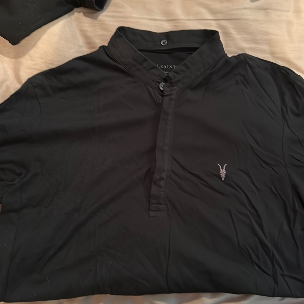 All Saints short sleeved shirt with ram skull logo. Small hole